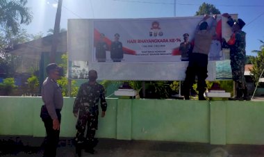 Wujud-Sinergitas-TNI-POLRI,-Koramil-1624-03-Lewoleba-Pasang-Spanduk-Hari-Bhayangkara-Ke-74.