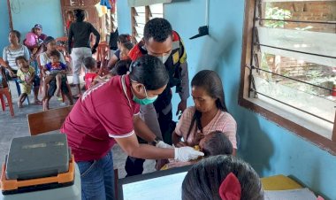 HUT-Bhayangkara,-Bhabinkamtibmas-Pantau-Dan-Amankan-Giat-Imunisasi-Anak