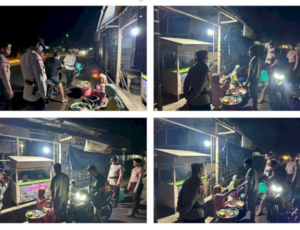 PASTIKAN AKTIVITAS MASYARAKAT MALAM HARI TETAP AMAN, PIKET FUNGSI POLRES LEMBATA GELAR PATROLI DAN SAMBANGI PENJUAL IKAN SERTA ANAK MUDA DI JALAN TRANS WANGATOA.