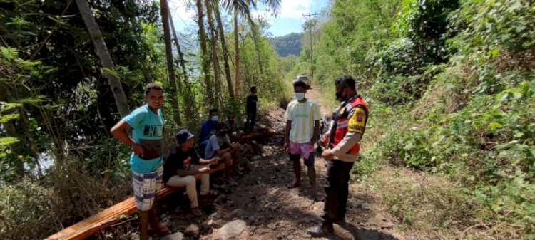 Bhabinkamtibmas Ingatkan Warga Waspadai Perubahan Cuaca.