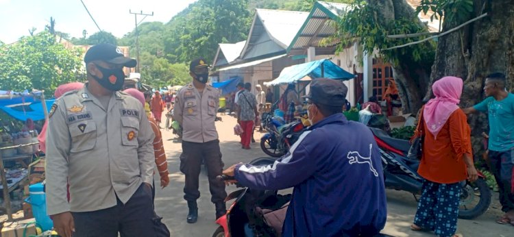 Kapolsek Buyasuri Pantau Giat Masyarakat Dan Himbau Agar Selalu Menggunakan Masker.